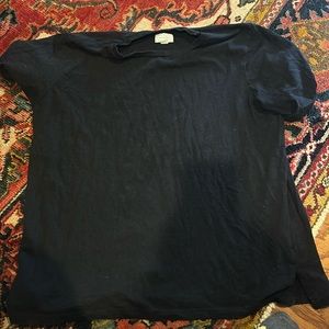 Plain black shirt.